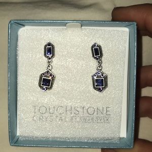Purple Touchstone crystal earrings by Swarovski